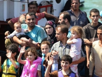 Беженцы впервые покидают Италию  